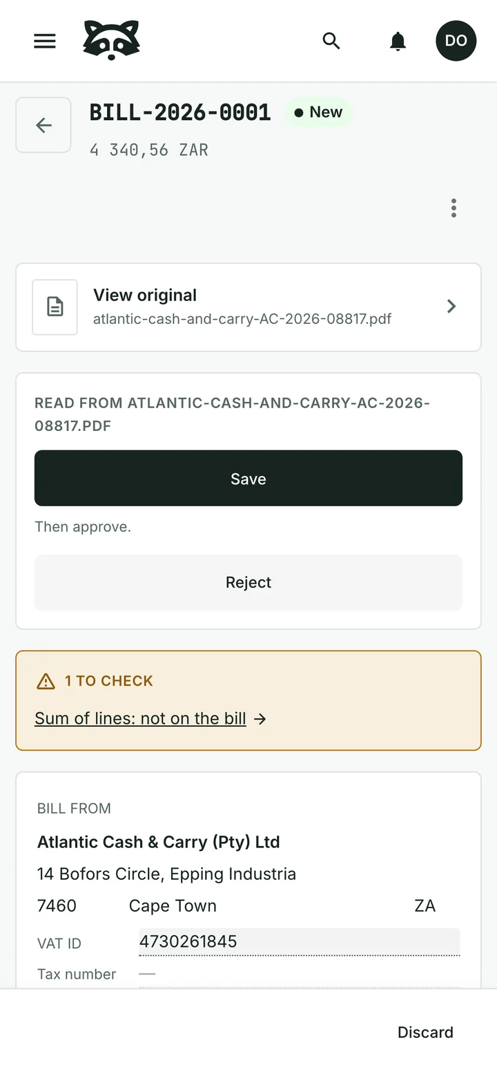 A supplier invoice from Atlantic Cash & Carry read by the assistant: the supplier's name, address and VAT number filled in from the PDF, one point flagged to check, and Save and Reject waiting for a person